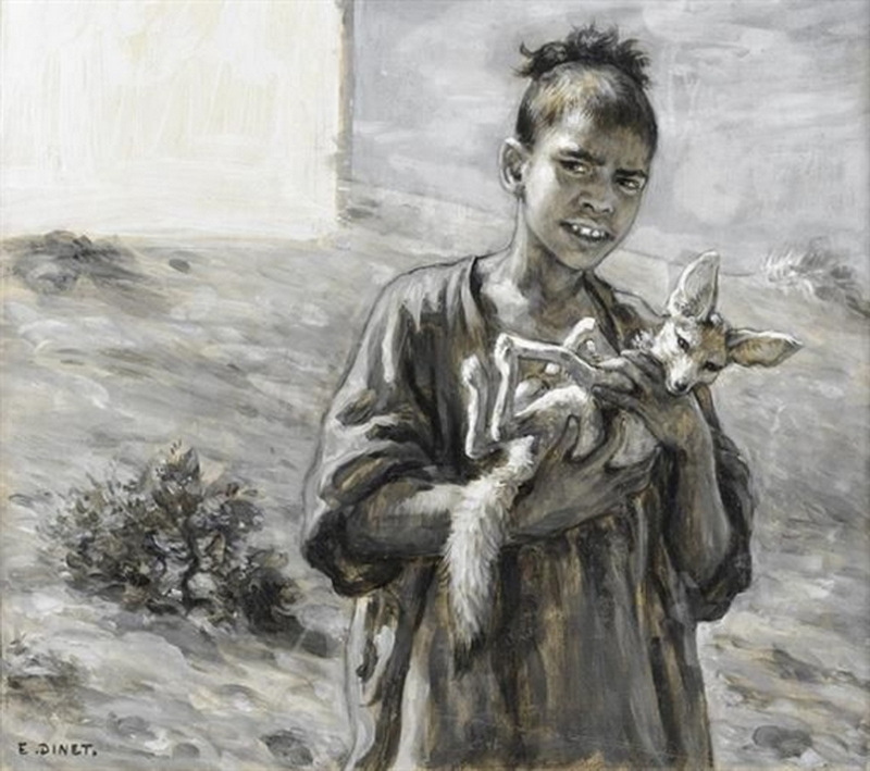 Un ragazzino con una volpe del deserto